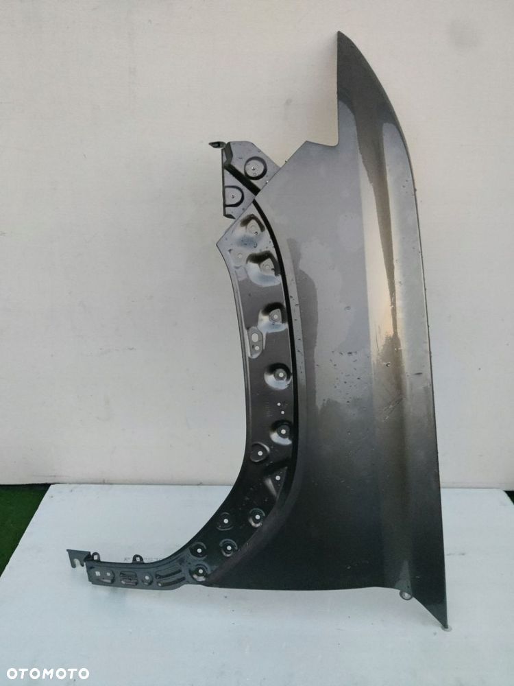 DACIA DUSTER III 3 BŁOTNIK PRZÓD PRZEDNI LEWY