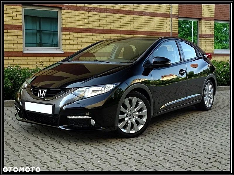 Honda Civic 1.4 i-VTEC Comfort Black Edition - 1