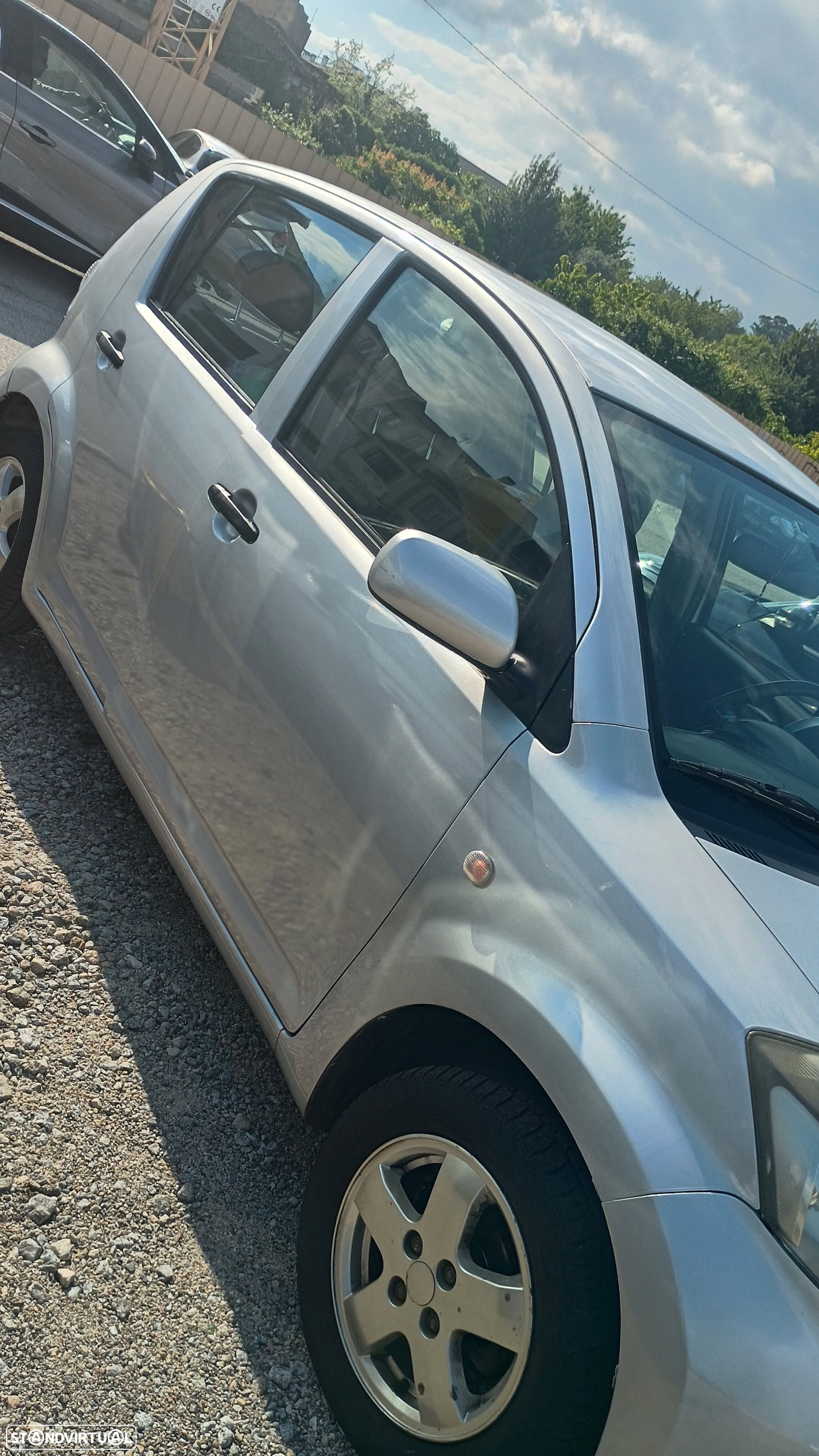 Daihatsu Sirion 1.0 - 7