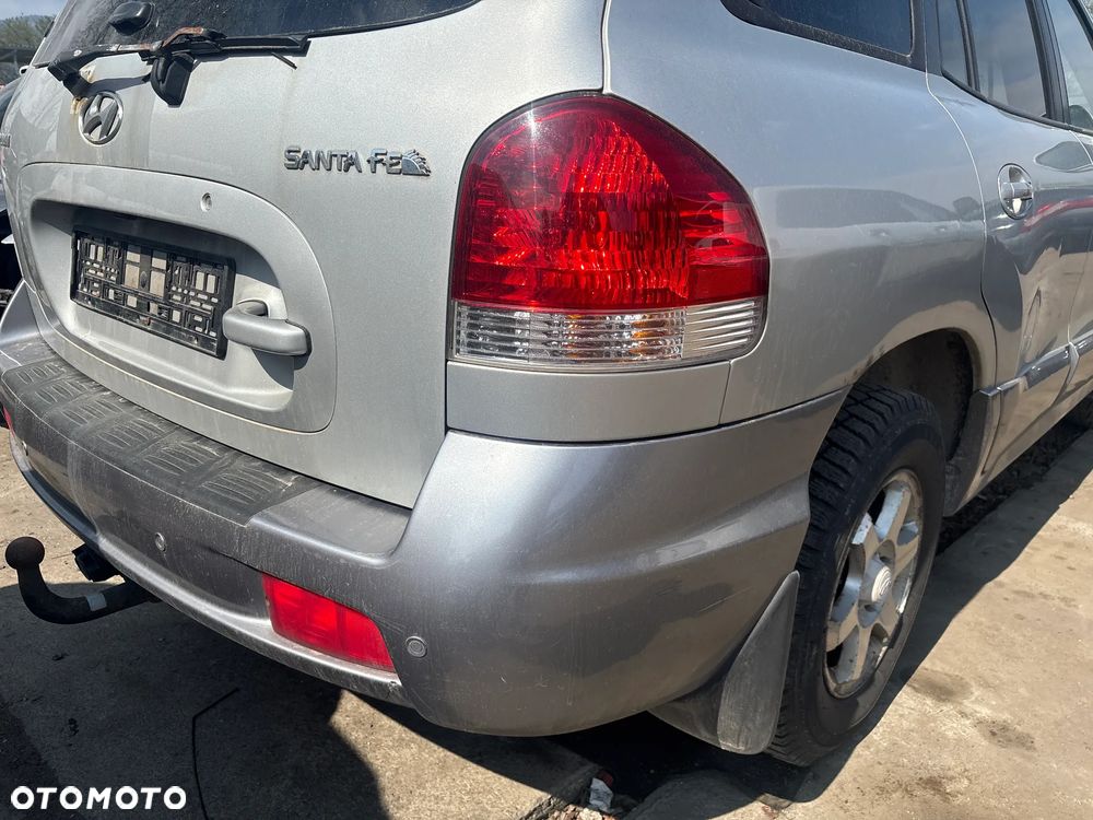 ZDERZAK TYLNY TYŁ HYUNDAI SANTA FE 2005R KOD LAKIERU LL - 1