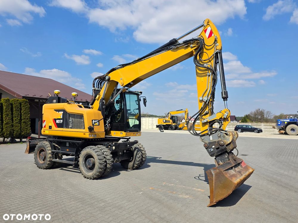 Caterpillar M317F, 2017 ROK, 8900 MTH, INSTALACJA SYSTEMU TRIMBLE - 7