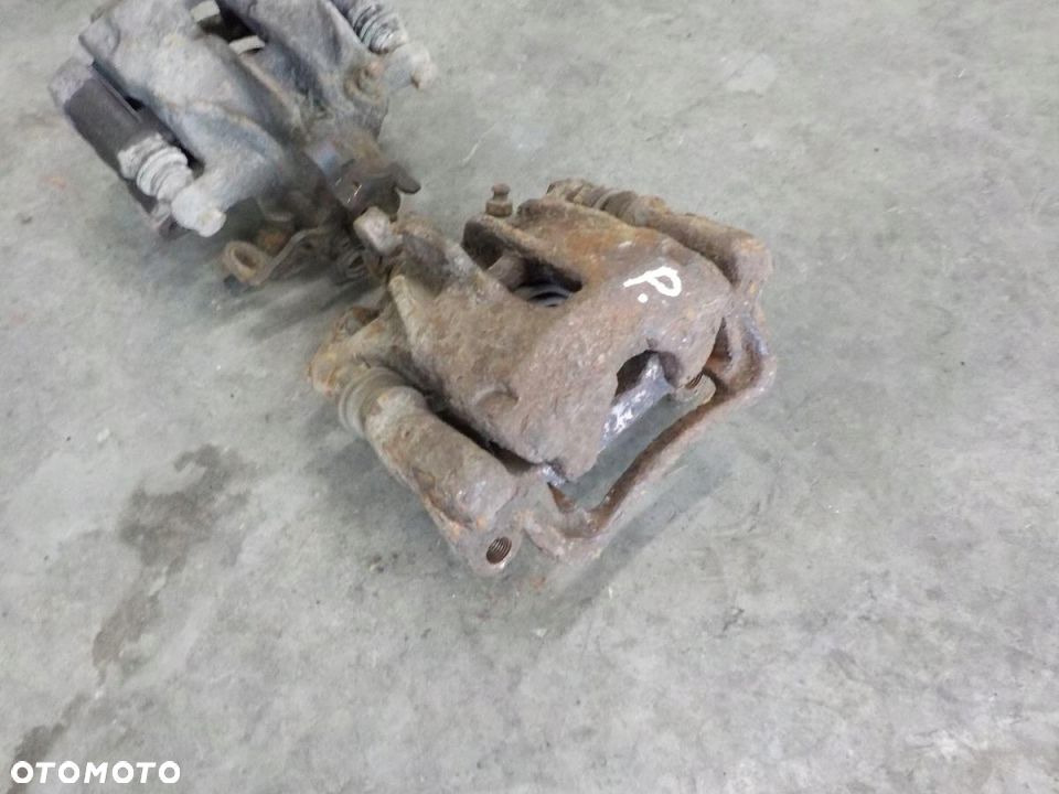 VW T4 96- ZACISK HAMULCOWY TYŁ LEWY PRAWY KOMPLETN - 3