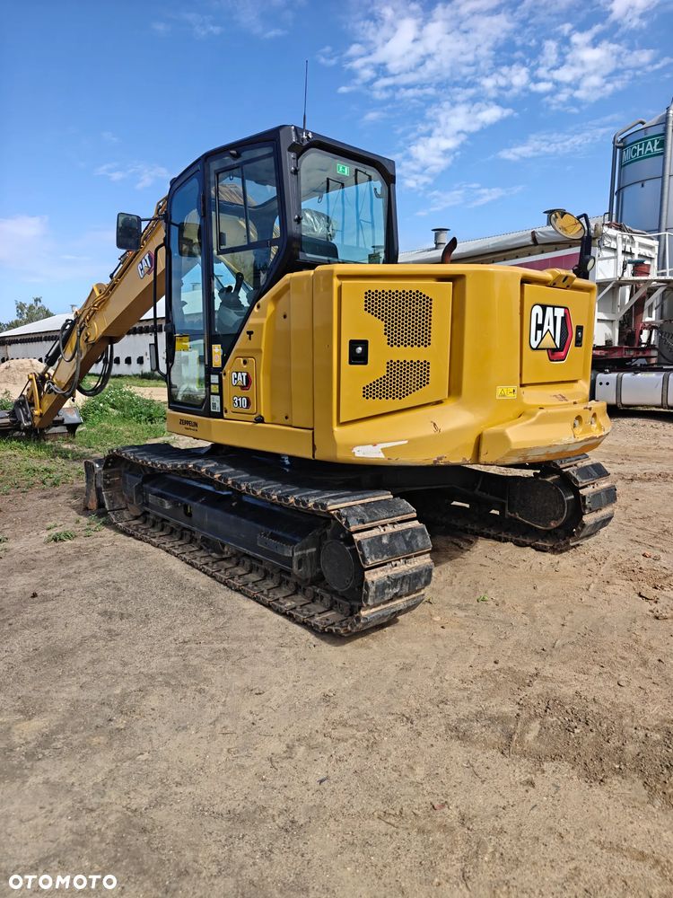 Caterpillar 310 - 3