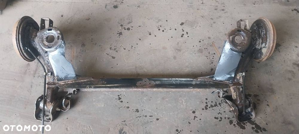 BELKA OŚ ZAWIESZENIA TYŁ BĘBNY Z ABS SKODA OCTAVIA I HB - 6