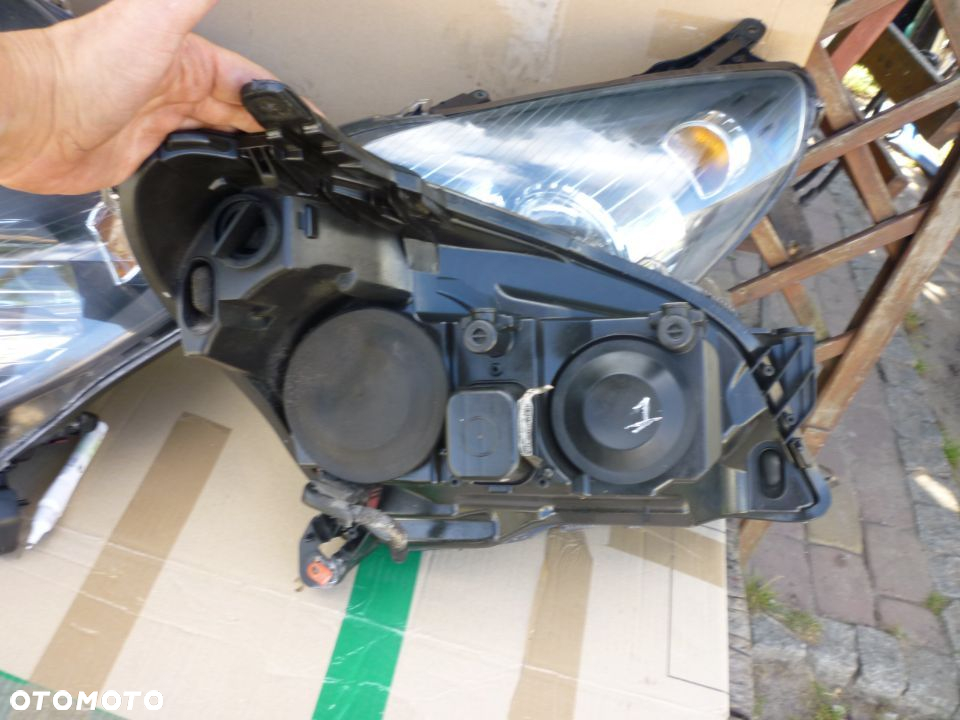 Lampa  lewa OPEL ASTRA H HELLA EUROPA - 3