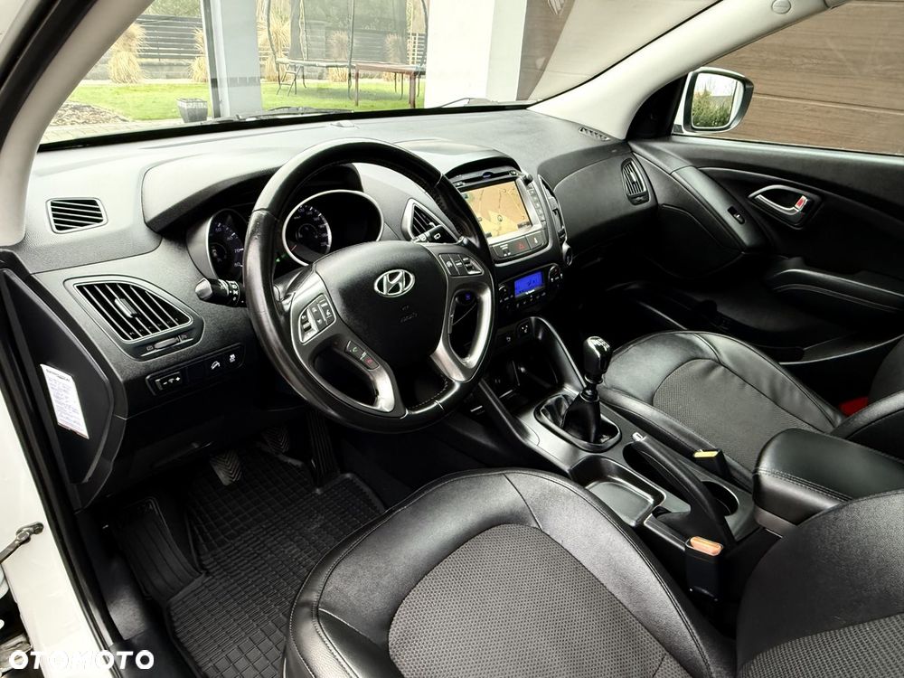 Hyundai ix35 blue 1.6 2WD Finale Gold - 13