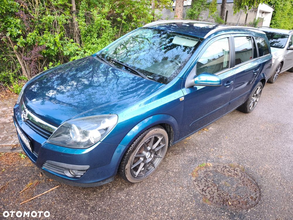 Opel Astra 1.8 Cosmo - 1