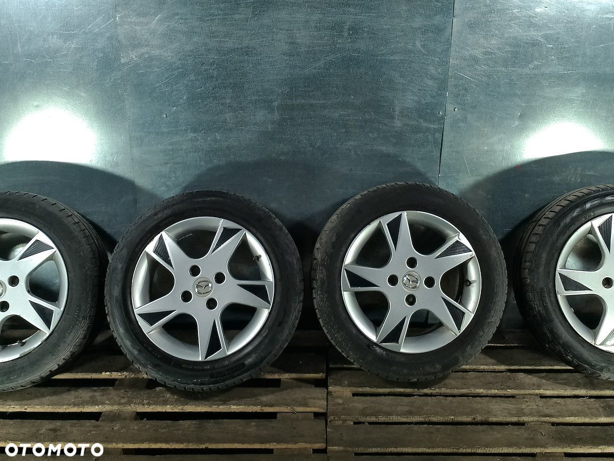 FELGI ALUMINIOWE Z OPONAMI 15  MAZDA 2 ( 03-07 ) - 1