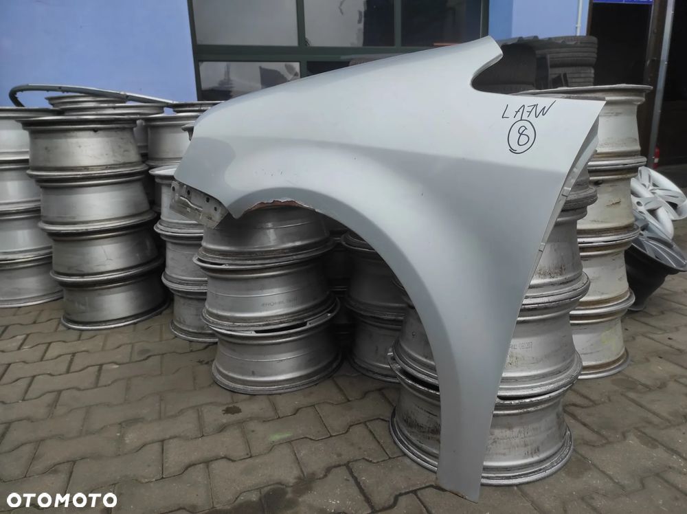 BŁOTNIK LEWY VW TOURAN 03-07R LA7W SREBRNY WYSYŁKA !!!! - 2