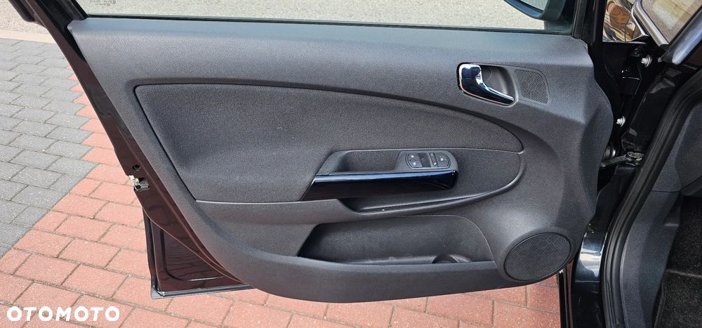 Opel Corsa 1.4 16V Active - 11