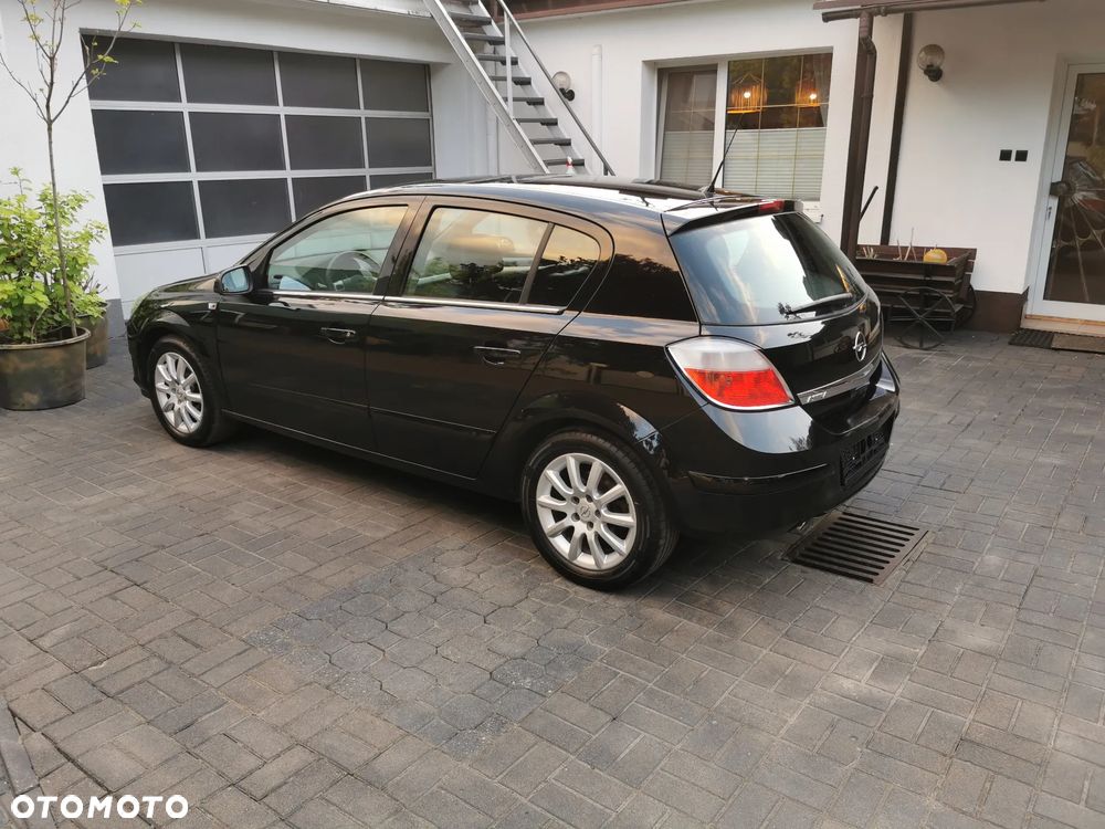 Opel Astra 1.8 Sport - 11
