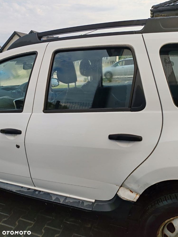 Drzwi lewe tył tylne białe DACIA DUSTER I 10-17 OD34 - 1