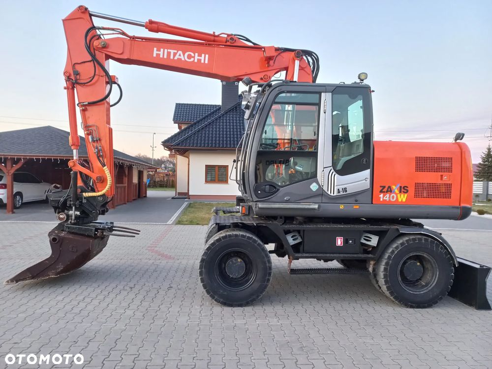 Hitachi ZX140 ROTOTILT - 11