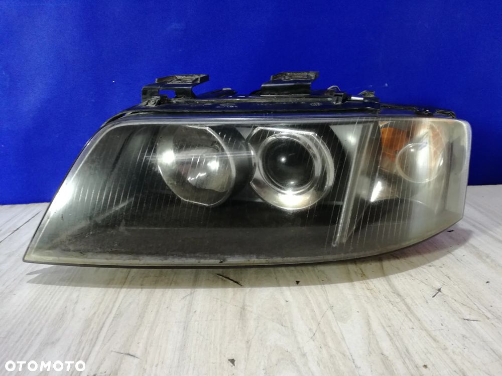 Audi A6 C5 Allroad Lift lampa reflektor lewa soczewka Europa 01/04 - 2