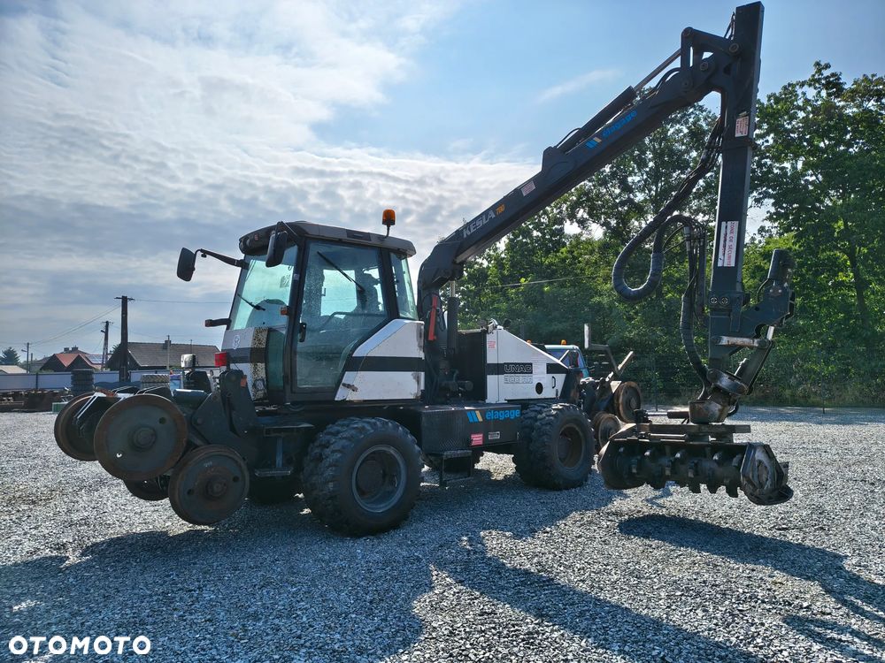 Caterpillar Caterpillar UNAC 300RR Mulczer kolejowy Liebherr atlas dwudrogowy zw - 1