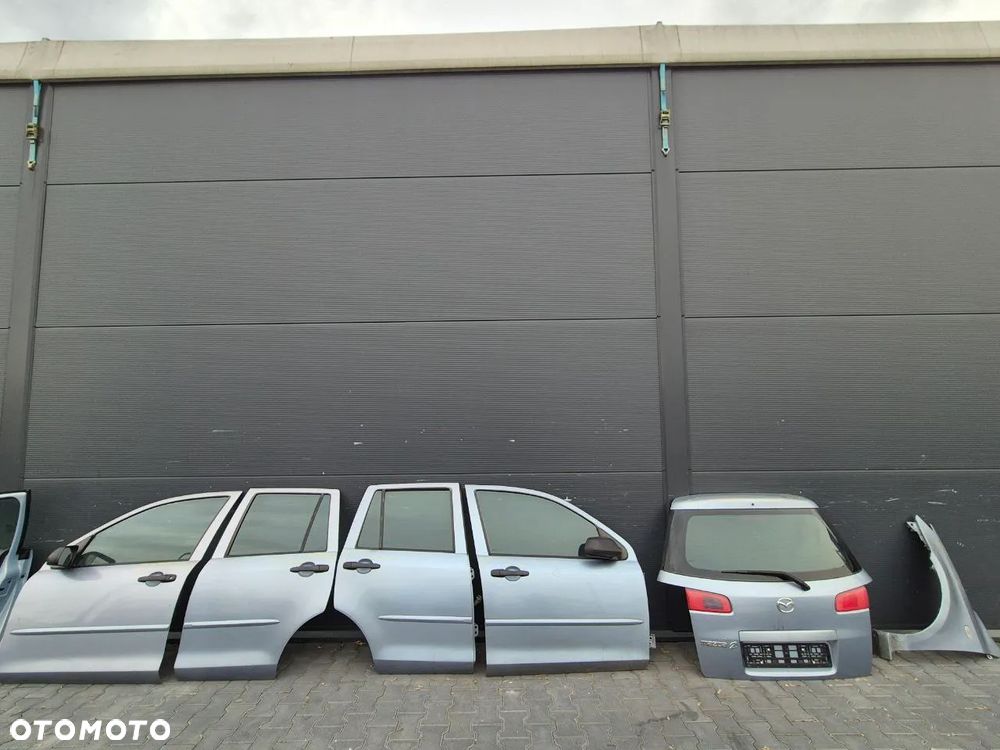 MAZDA 2 I DY  DRZWI / KLAPA BAGAŻNIKA / BŁOTNIK ( BŁĘKITNY JASNO NIEBIESKI 12R030196 ) - 1