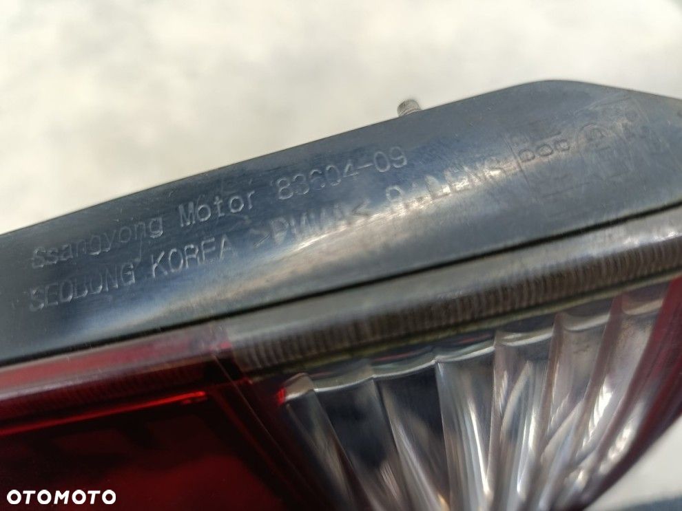 SSANGYONG KYRON PRAWA TYLNA LAMPA KLAPA ORYGINAŁ 83604-09 - 4