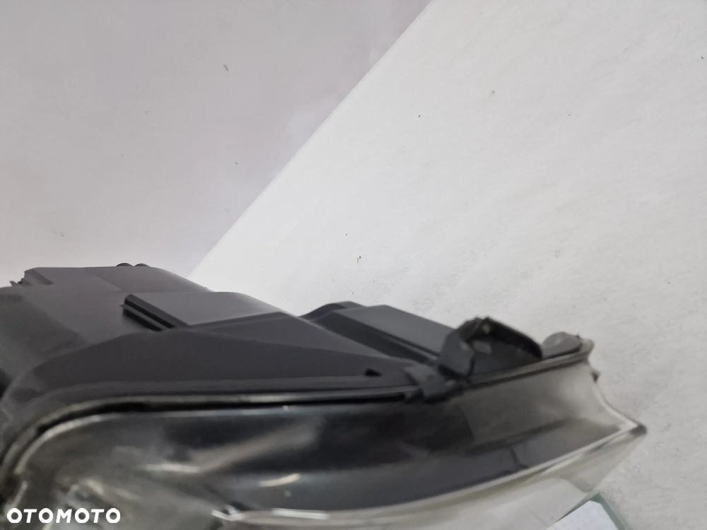 VW T5 LIFT 7E0 MULTIVAN 10- PRAWA ZWYKŁA LAMPA PRZEDNIA PRZÓD , NR 7E1941016J , NR AUKCJI LA63 - 12
