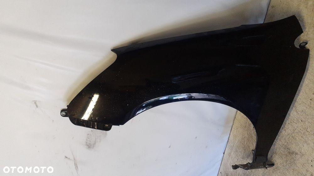 * BŁOTNIK LEWY DO HONDA CIVIC VII LIFT  B92P CZARNY - 2