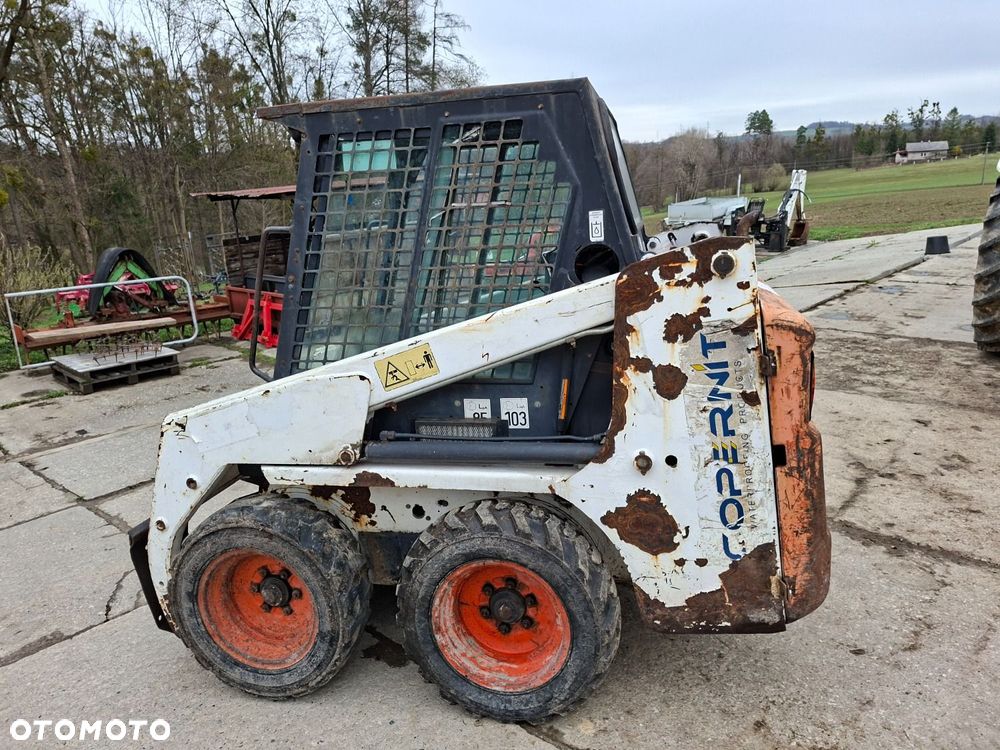 Bobcat 553 4X4 + Melroe Ingersoll-Rand 725S B/H - 9