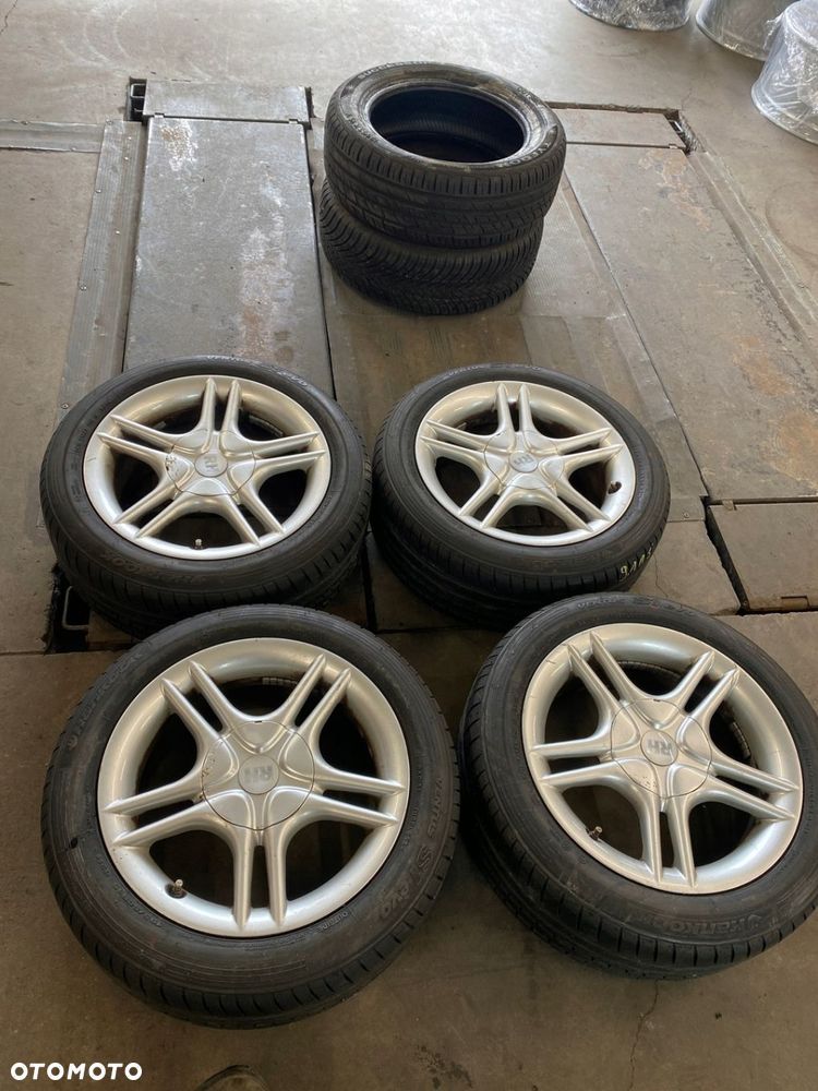 FELGI Aluminiowe RH 4x100 7jx15 et37 - 1