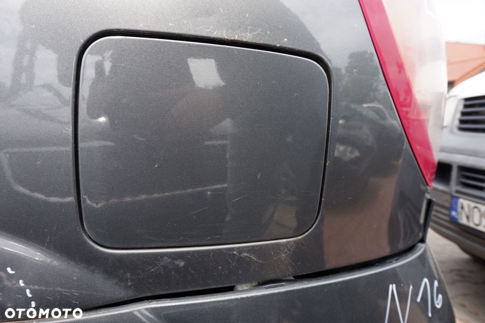 KLAPKA WLEWU PALIWA ALMERA II N16 LIFT 5D HB KY5 788304M730 NISSAN 2003-2006 - 1