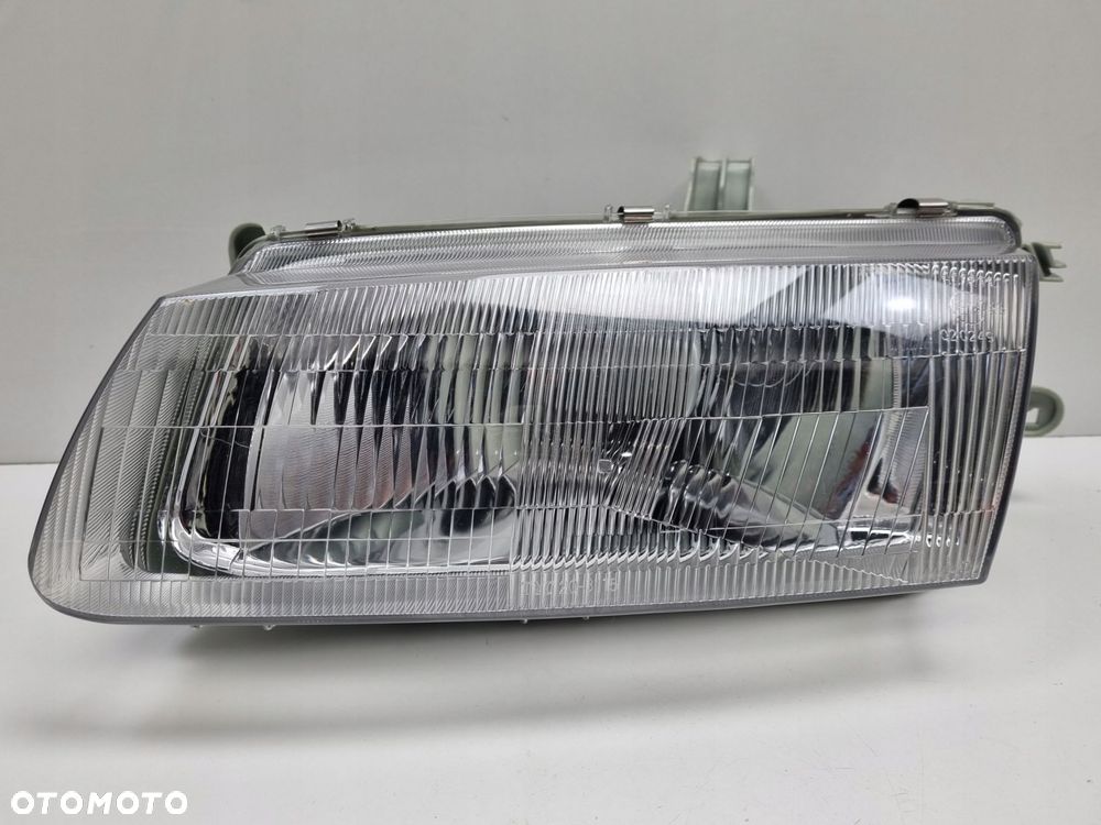 LAMPA LEWA Mazda 323 BA SEDAN 95-98r PRZEDNIA LEWY PRZÓD nowa - 2
