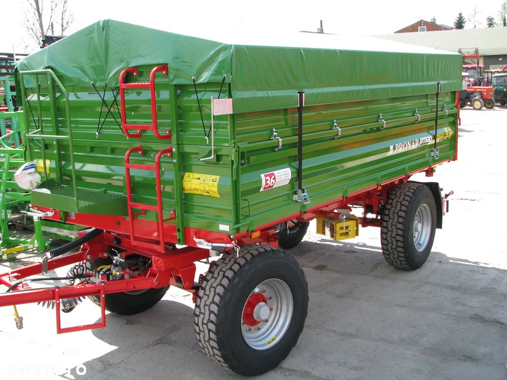 Pronar Przyczepa dwuosiowa paletowa Pronar PT-610 -10-ton, Przyczepa Pronar PT-653/2 - 6-ton z mechanizmem trójstronnego wywrotu, nadstawy, plandeka, balkon - 17