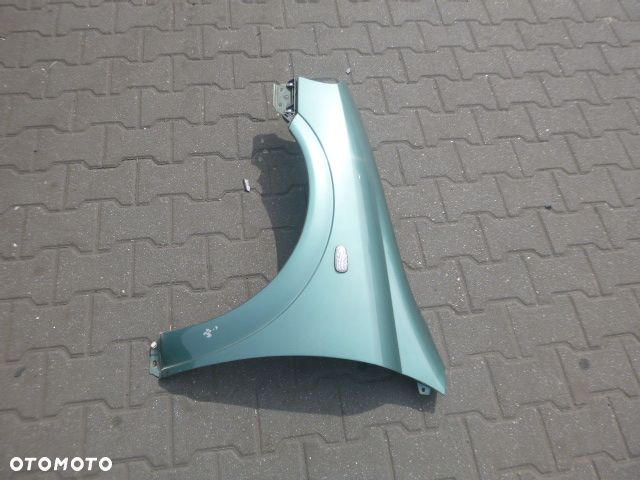 BŁOTNIK LEWY PRZÓD LEWY PRZEDNI OPEL ASTRA II G Z374 - 9