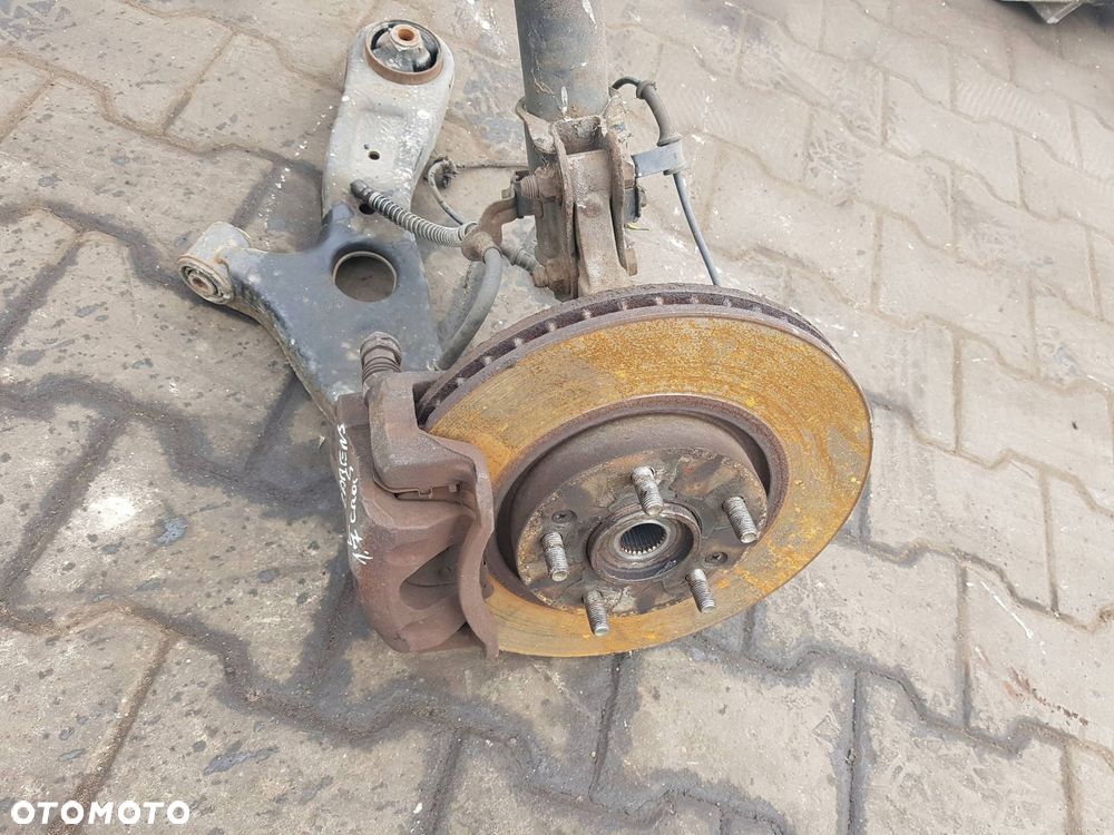 KIA CARENS IV 13-19r 1.7 CRDI WAHACZ AMORTYZATOR ZWROTNICA LEWA PRZÓD - 2