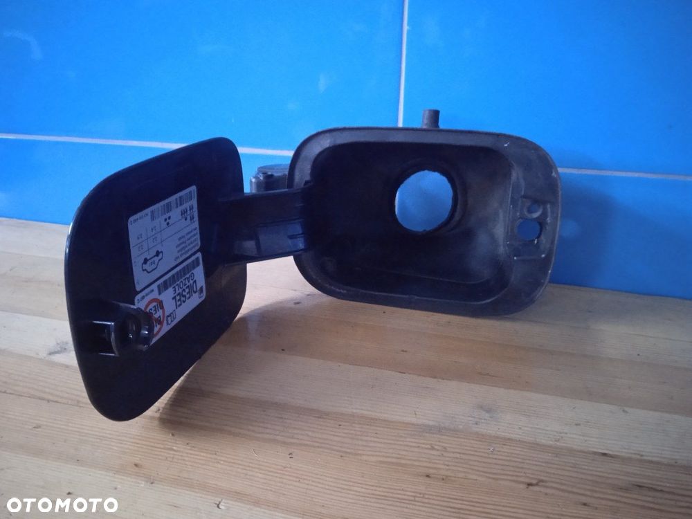 Klapa wlewu paliwa Golf 5 Kombi 1K0010497C kolor LC5F - 2