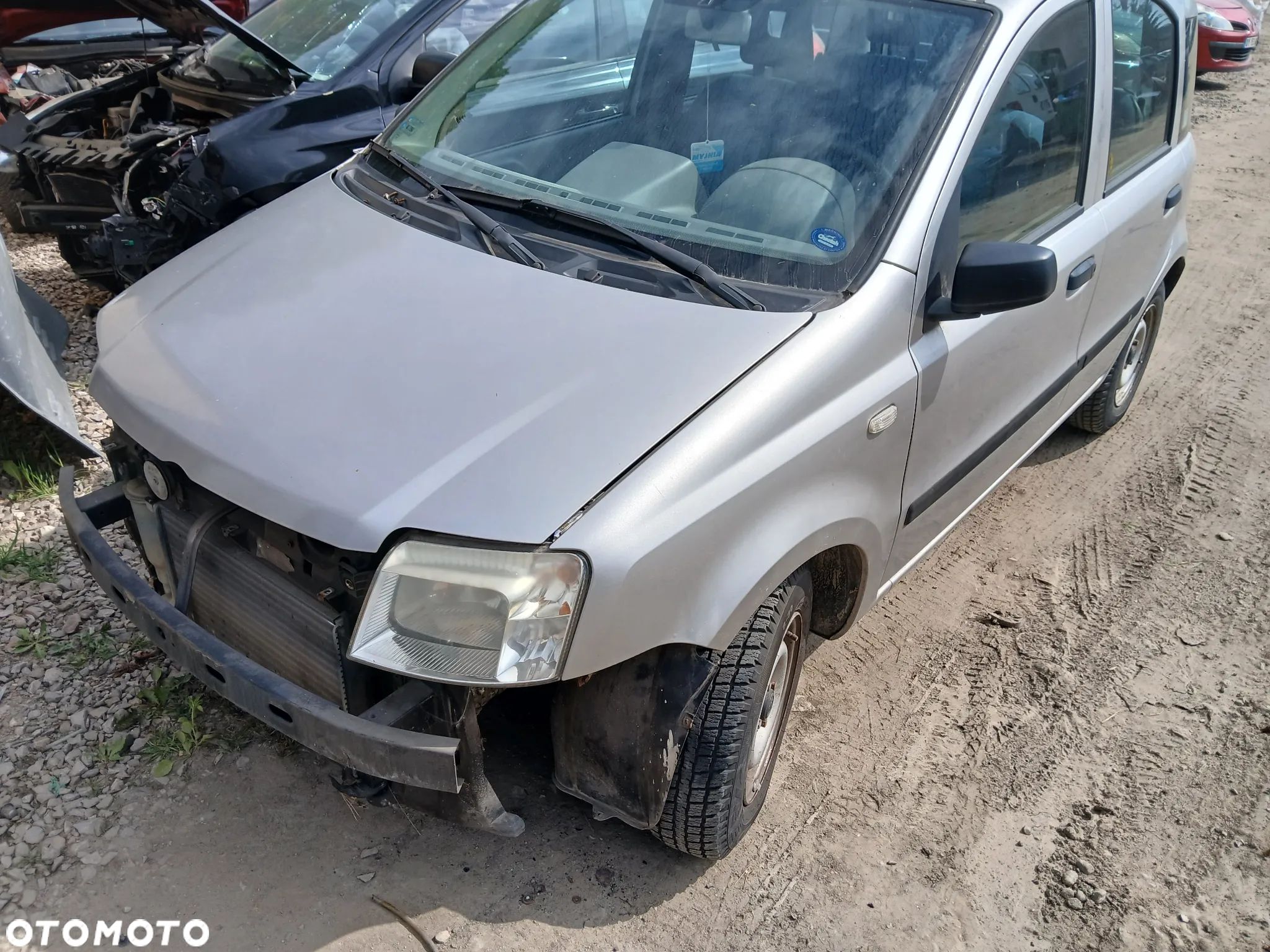 fiat panda II fotel fotele kanapa deska kokpit podsufitka boczek boczki klamka podłokietnik licznik - 1