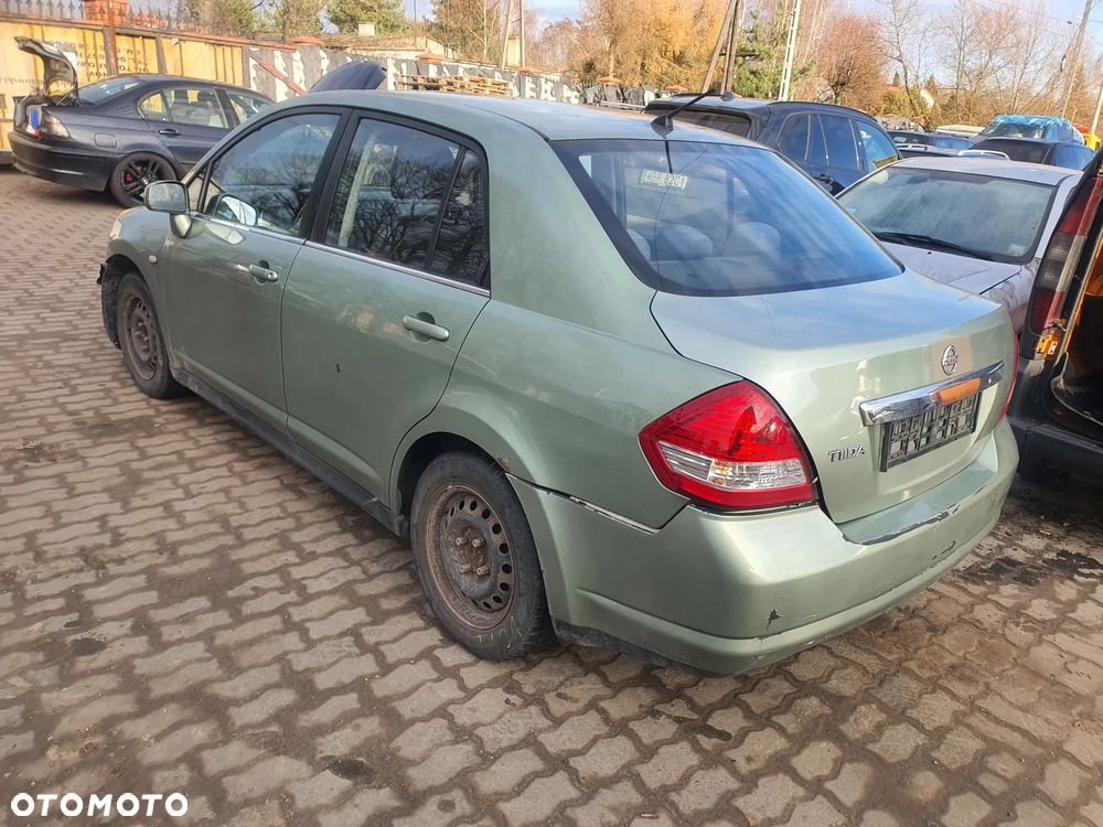 nissan tida fotel kanapa deska kokpit podsufitka boczek podłokietnik licznik panel szyb stacyjka