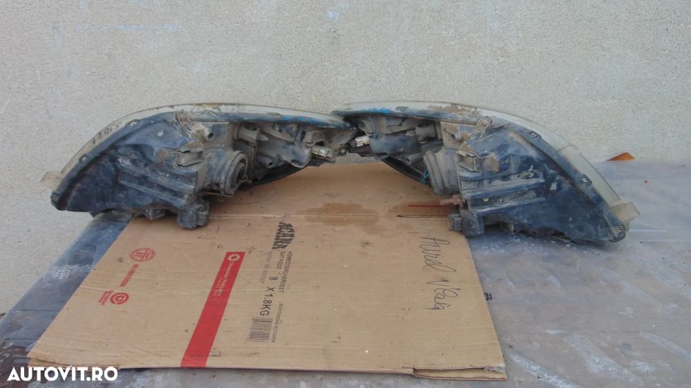 Faruri Toyota Yaris an 2006 cod 89900736 cu defect - 5