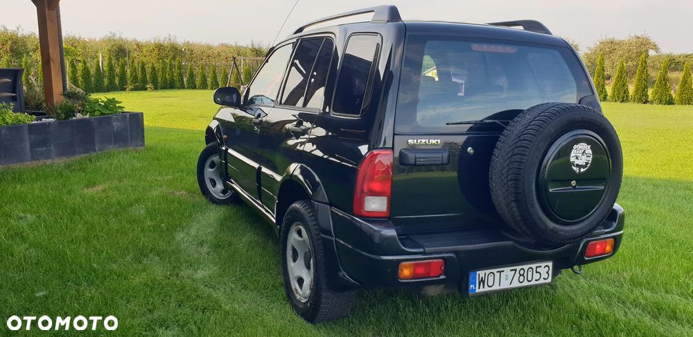 Suzuki Grand Vitara 2.0 - 7
