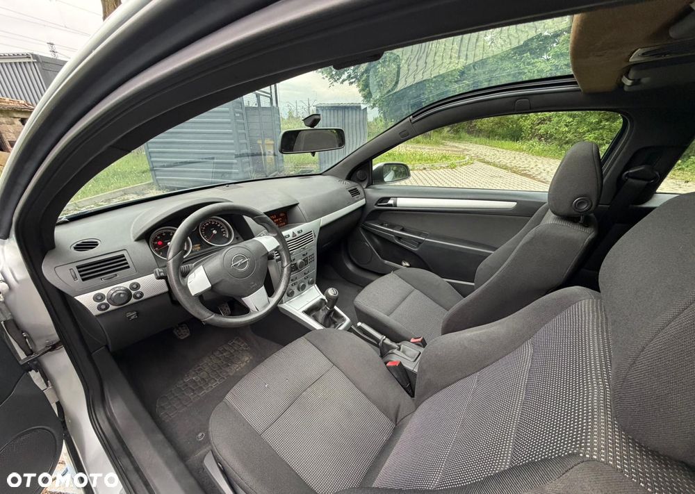 Opel Astra 1.8 Cosmo - 12