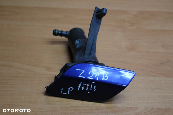 SPRYSKIWACZ LAMPY LEWY PRZÓD PRZEDNI OPEL ASTRA H Z21B