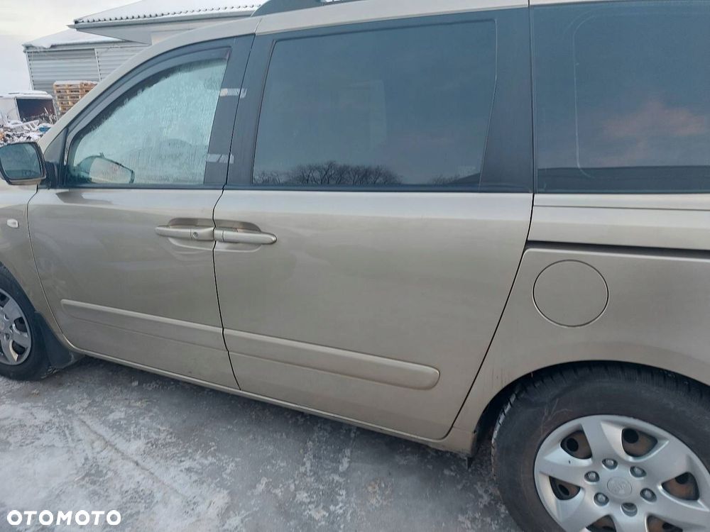DRZWI KOMPLETNE LEWY TYŁ KIA CARNIVAL II J9 - 2