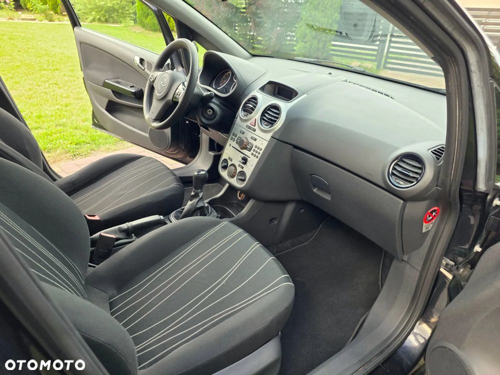 Opel Corsa 1.4 16V Enjoy - 8