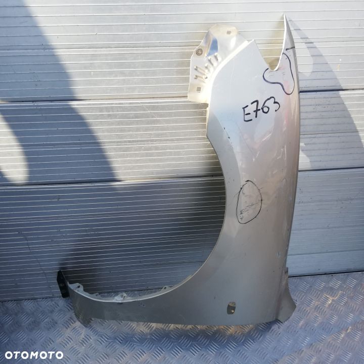 E763/F770/H3/H126/H131/H437/H438/H604 LEWY BŁOTNIK MAZDA 3 SEDAN - 1