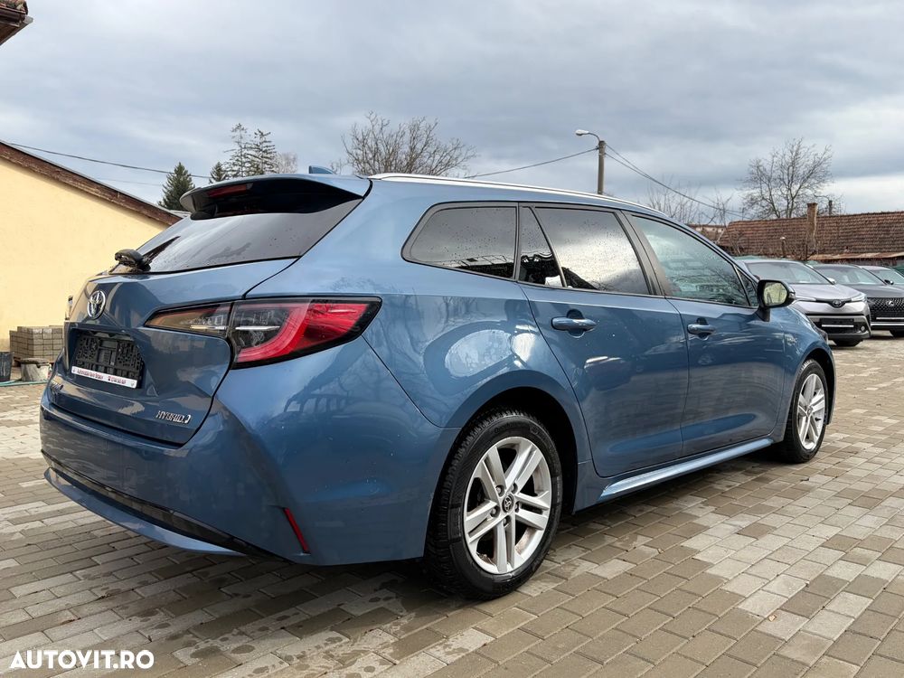 Toyota Corolla 1.8 HSD Business - 32