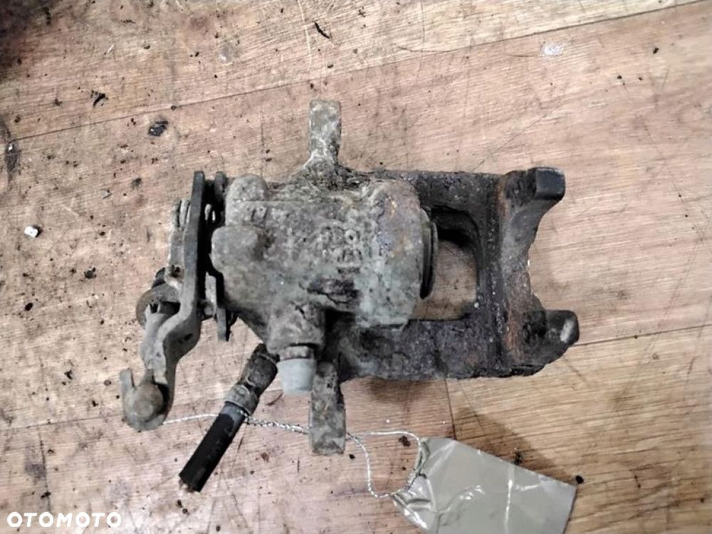 skoda octavia ii zacisk hamulcowy prawy tył - 1