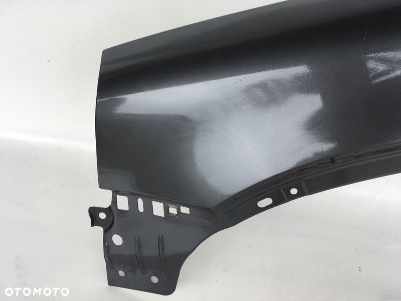BŁOTNIK PRZEDNI LEWY VOLVO XC 90 I 02-14 - 2