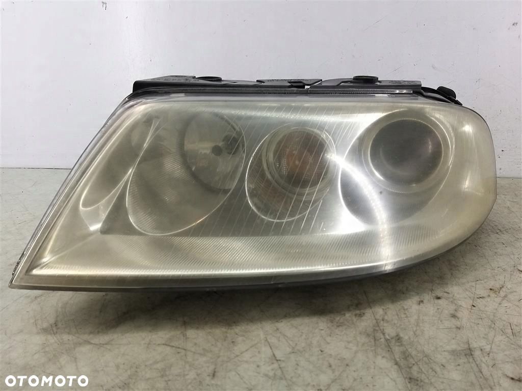 Reflektor lampa przód lewa VW Passat B5  B5 LIFT 2000-2005 HELLA XENON - 1