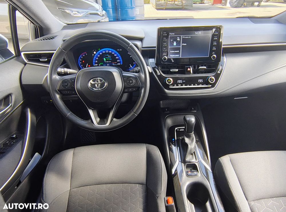 Toyota Corolla 1.8 HSD Business - 6