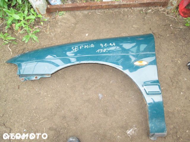 BŁOTNIK KIA SEPHIA 91-94 LEWY - 1