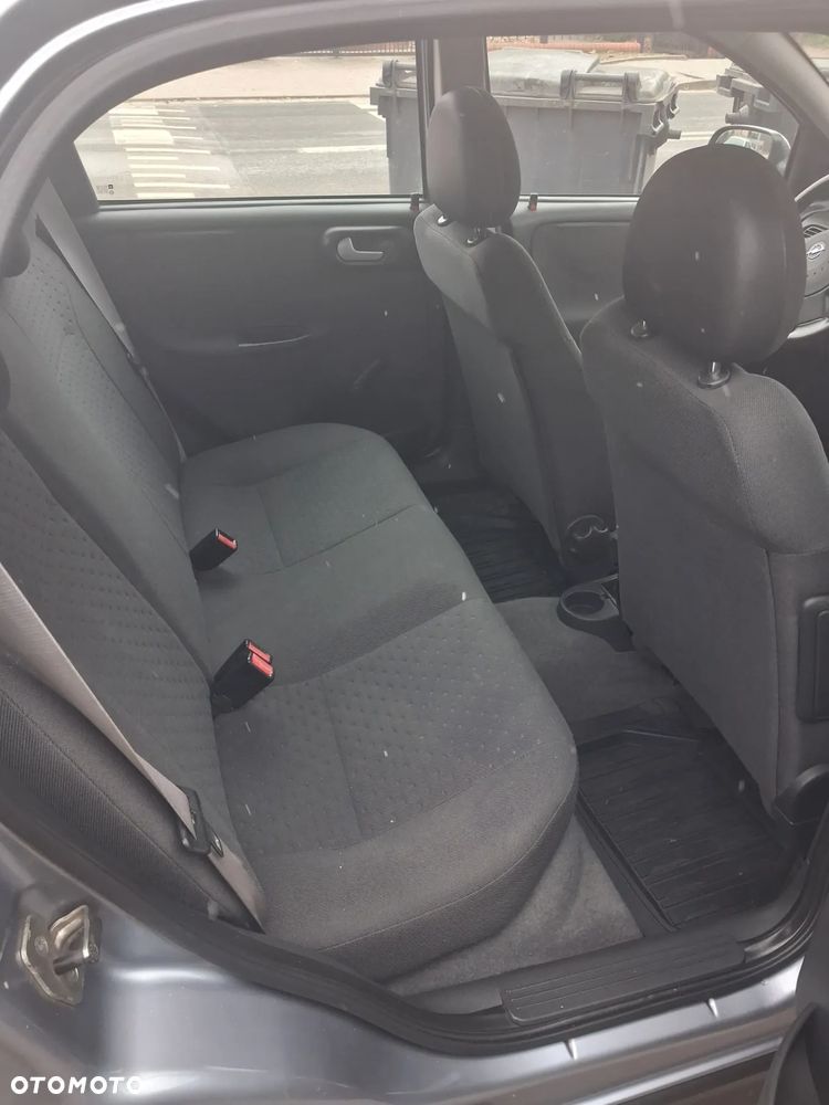 Opel Corsa 1.4 16V Enjoy - 13