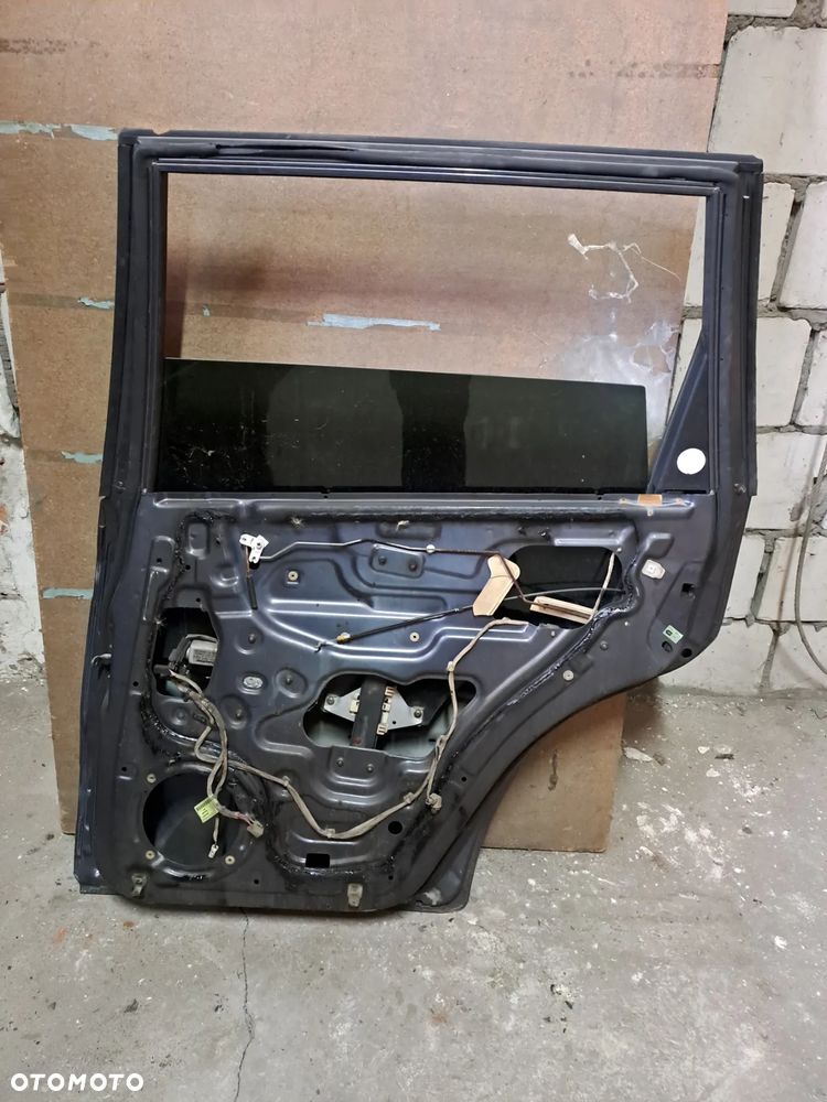 Drzwi Ssangyong Rexton I 01-07' prawy tył (czarne) - 2