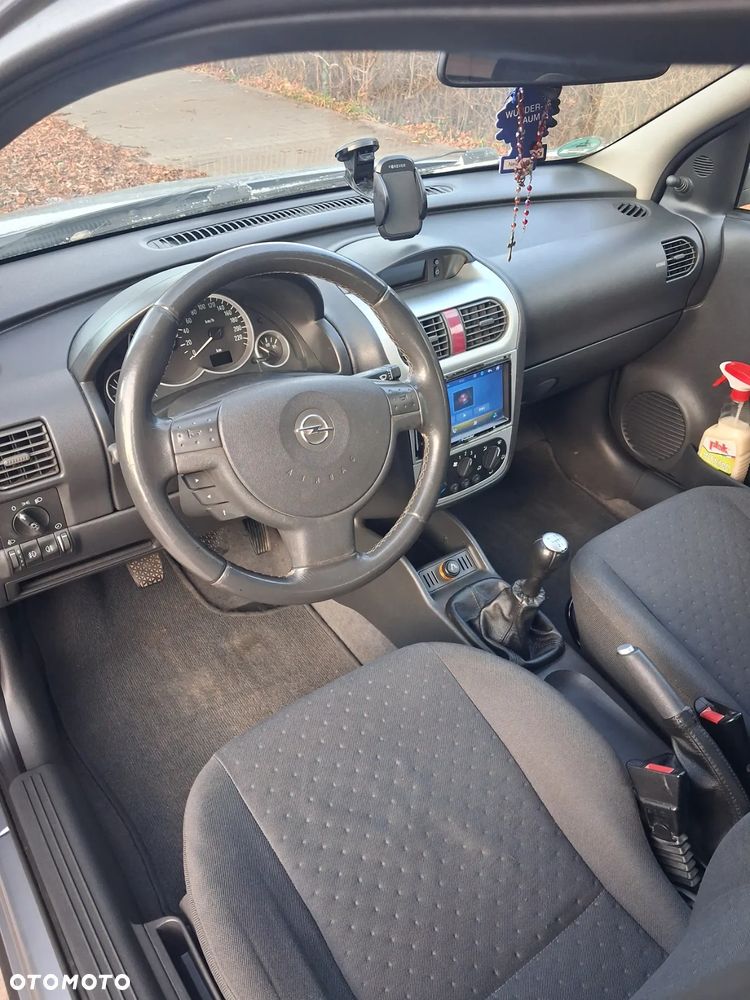 Opel Corsa 1.4 16V Enjoy - 11