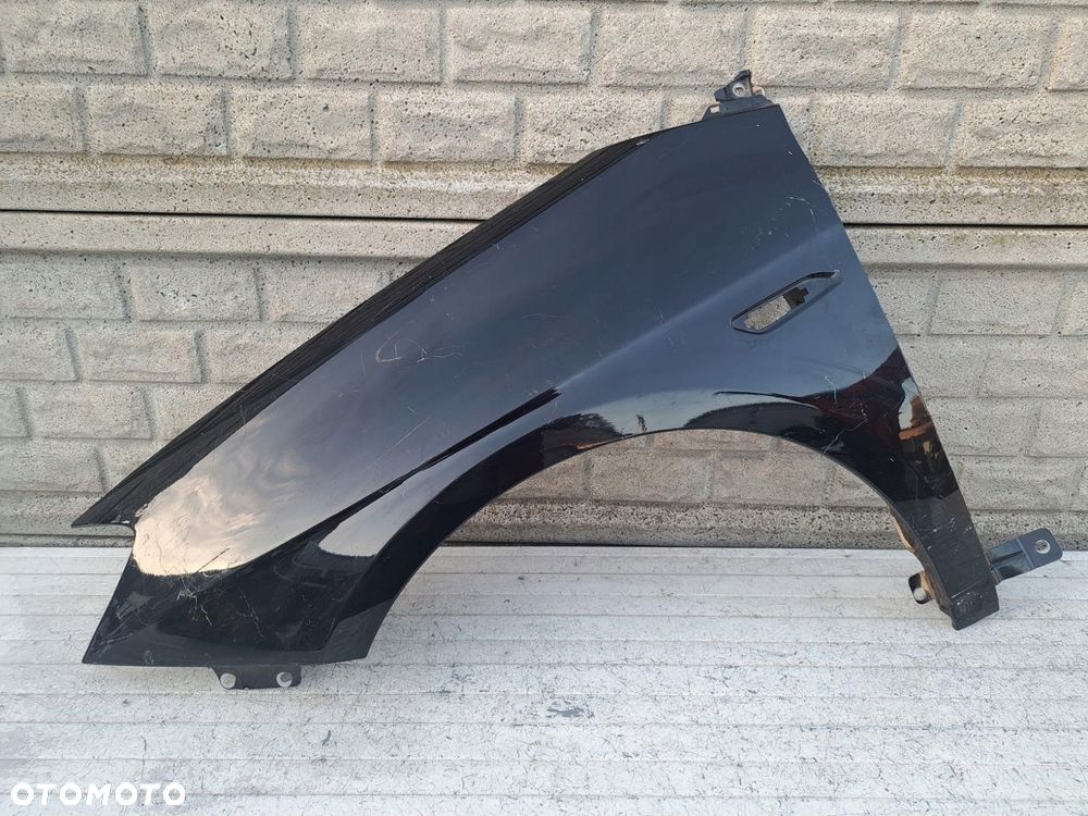 lancia delta 08-14 błotnik przedni lewy oryginał - 1